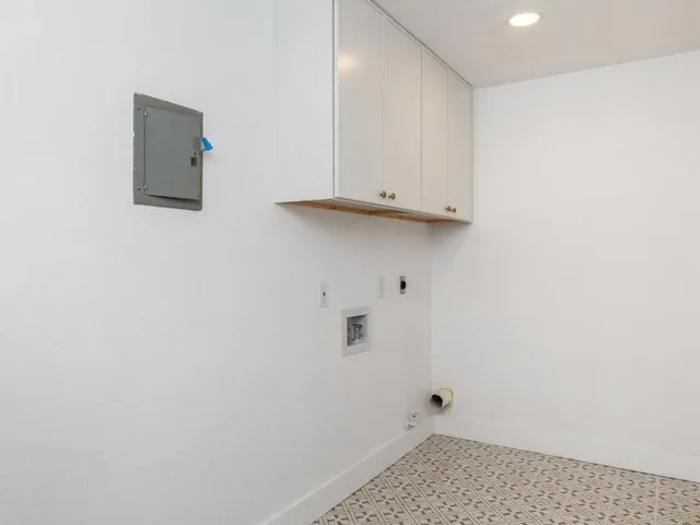 a bathroom with a sink and a window