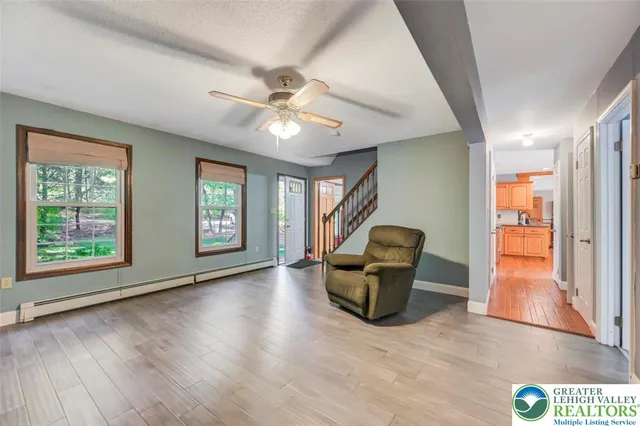 a view of a living room and dining room