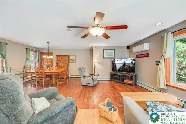 a bed room with a bed and a chandelier