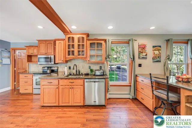 a room with furniture and a large window