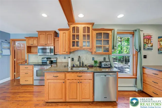 a bedroom with a large bed and a large window