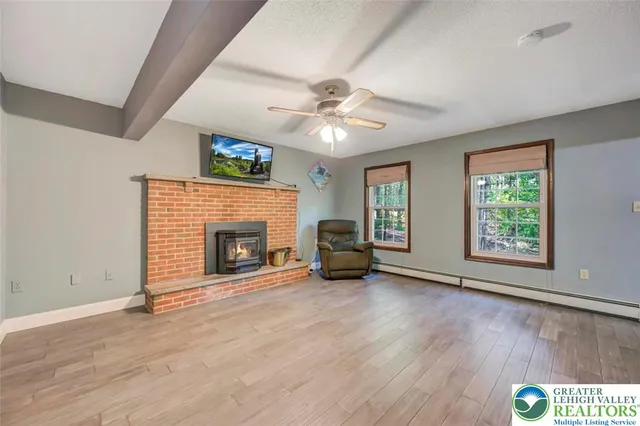 a kitchen with stainless steel appliances granite countertop a stove and cabinets