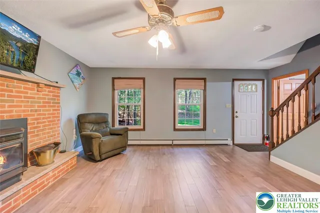 a kitchen with stainless steel appliances granite countertop sink stove top oven and cabinets