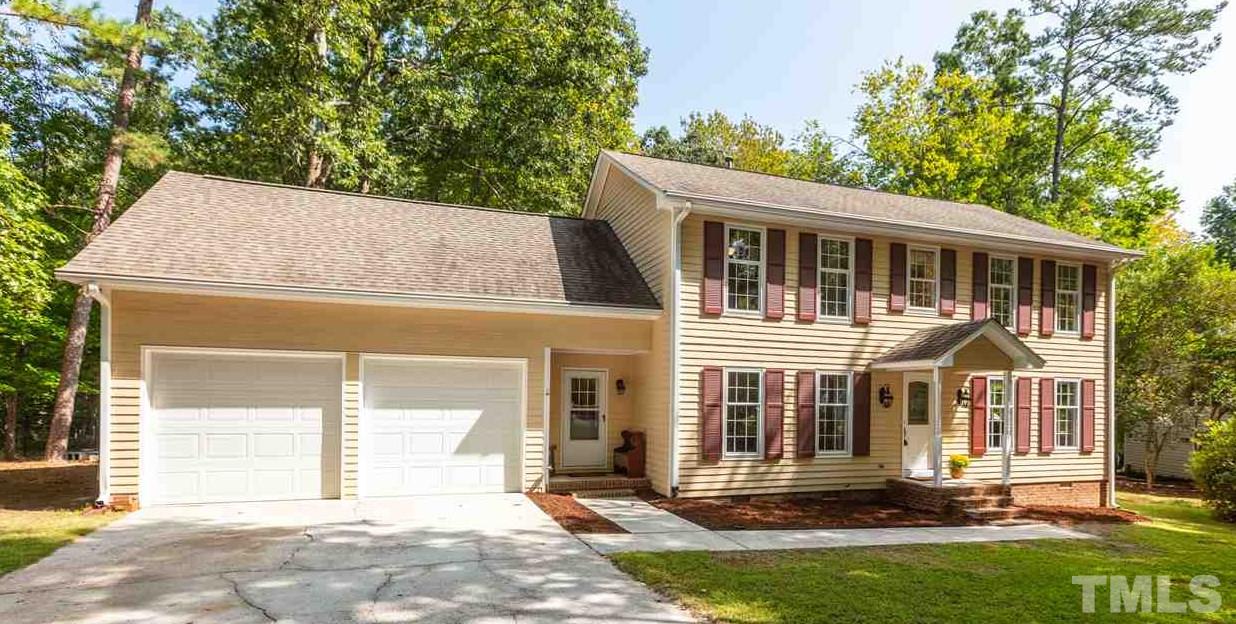 11508 Hardwick Court Raleigh, NC 27614 - Photo 1 of 30 a front view of a house with a yard