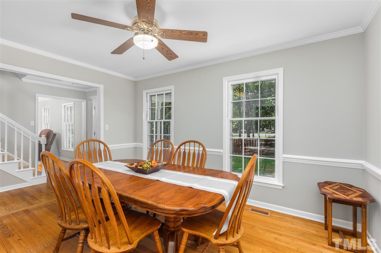 11508 Hardwick Court Raleigh, NC 27614 - Photo 11 of 30 a view of a dining room with furniture and wooden floor