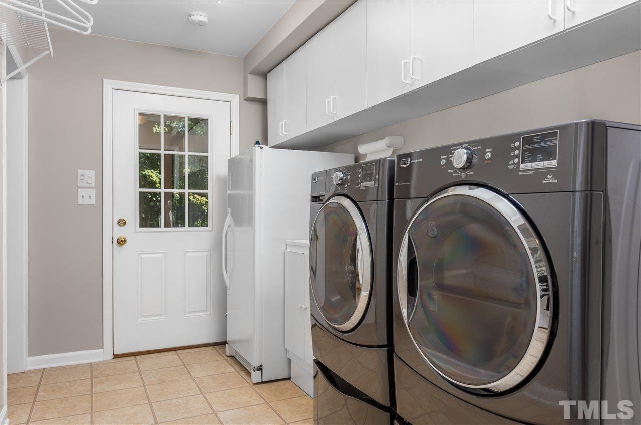 11508 Hardwick Court Raleigh, NC 27614 - Photo 14 of 30 a utility room with dryer and washer