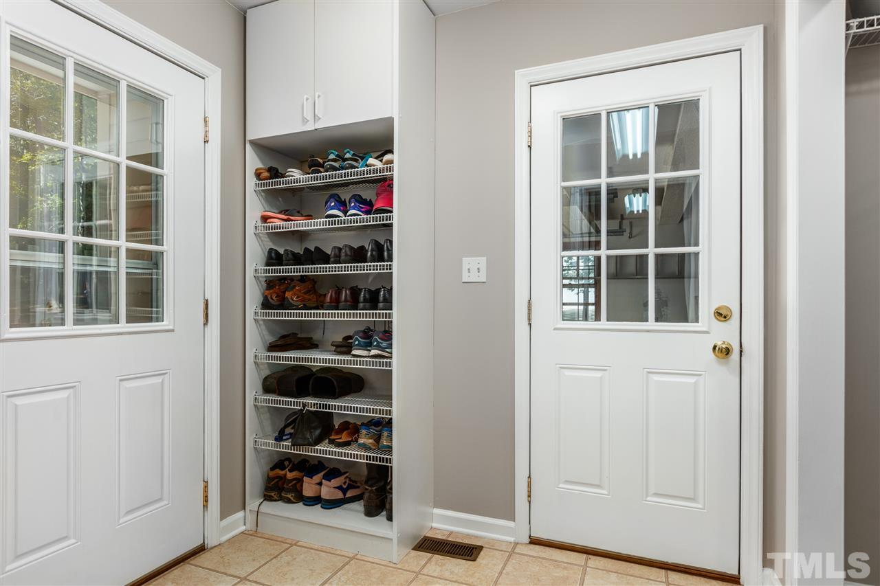 11508 Hardwick Court Raleigh, NC 27614 - Photo 15 of 30 a view of walk in closet with clothes and shoes