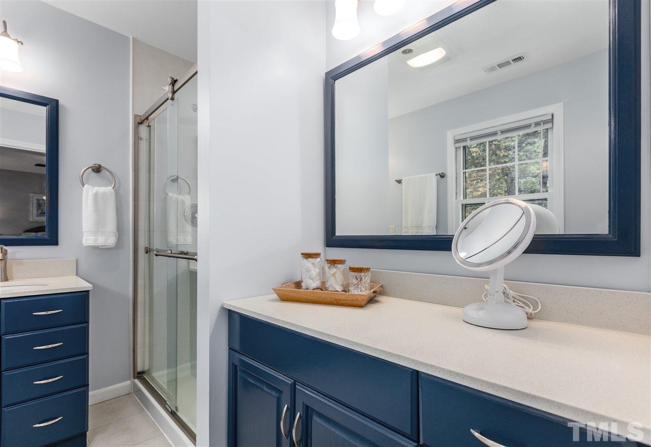 11508 Hardwick Court Raleigh, NC 27614 - Photo 25 of 30 a bathroom with a sink and a mirror