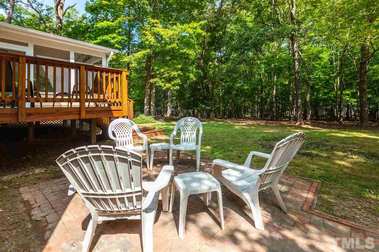 11508 Hardwick Court Raleigh, NC 27614 - Photo 29 of 30 a view of a chairs and table in backyard