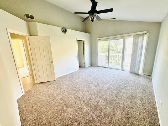 a view of empty room with windows