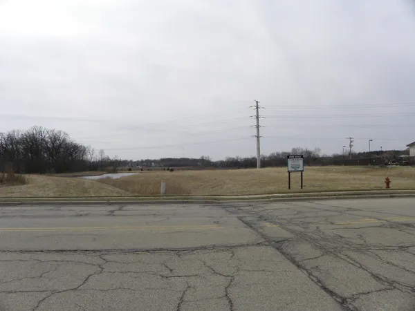 a view of a lake with a big yard