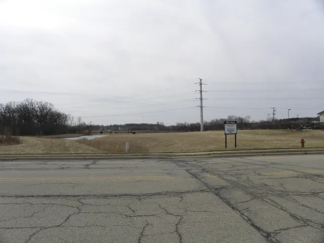 a view of a lake with a big yard