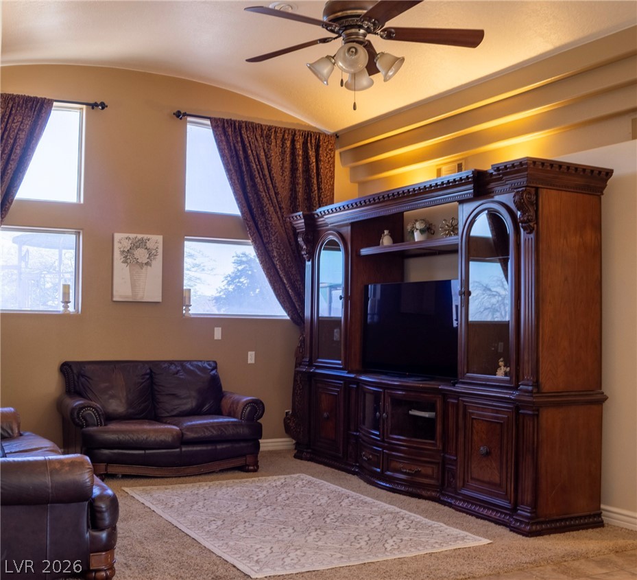 2775 Taylor Street Logandale, NV 89021 - Photo 15 of 41 This inviting living space features high ceilings and ample natural light, perfect for comfortable living.