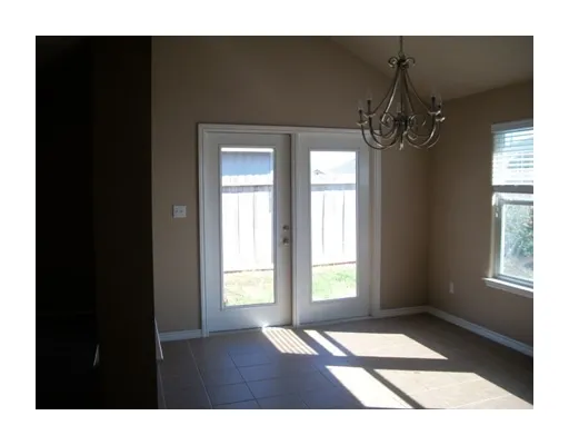 a picture of a room with windows