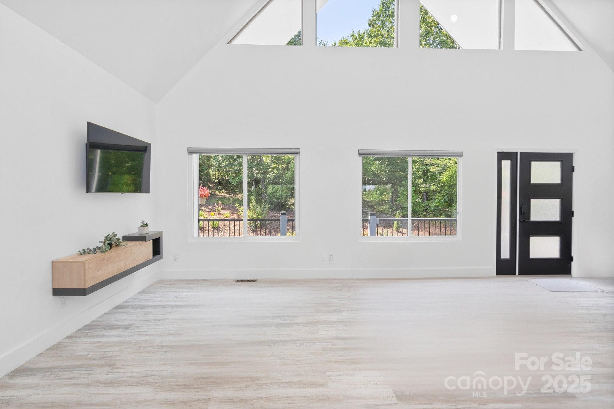 456 Hickory Loop Road Rutherfordton, NC 28139 - Photo 12 of 38 a view of an empty room with a window
