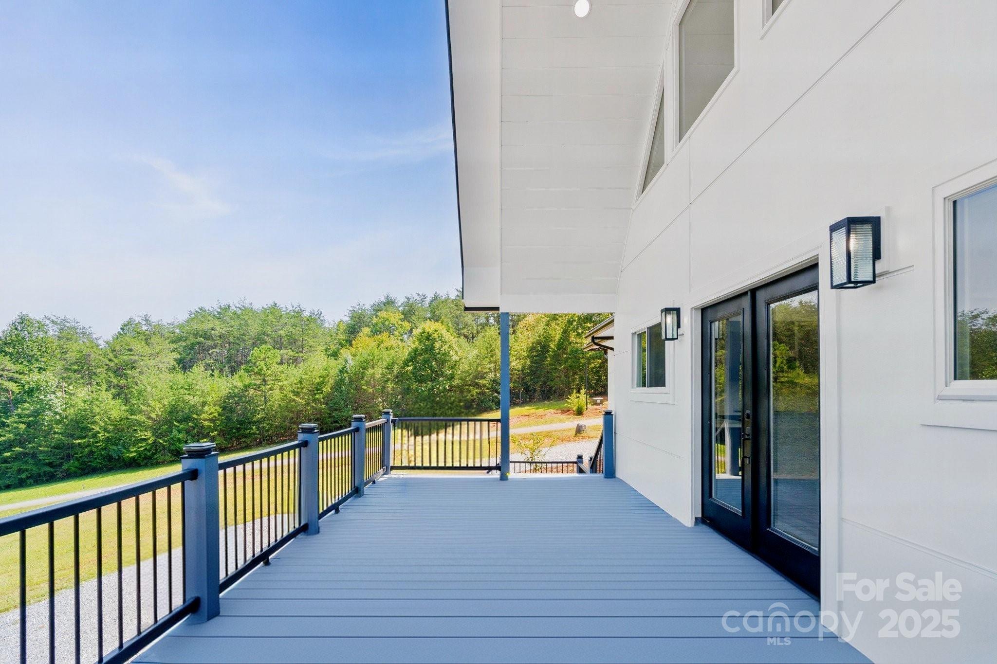 456 Hickory Loop Road Rutherfordton, NC 28139 - Photo 19 of 38 a view of a balcony with potted plants