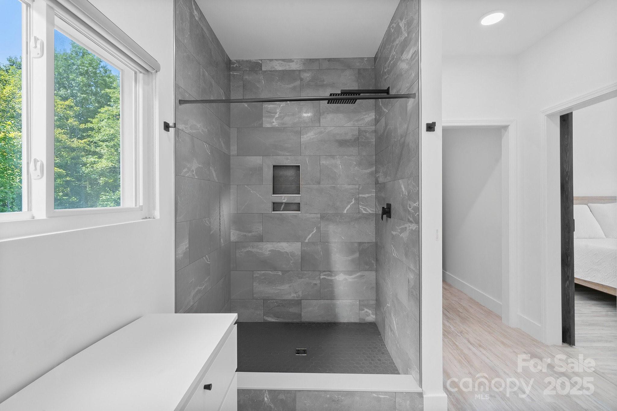 456 Hickory Loop Road Rutherfordton, NC 28139 - Photo 23 of 38 a bathroom with a shower and a sink