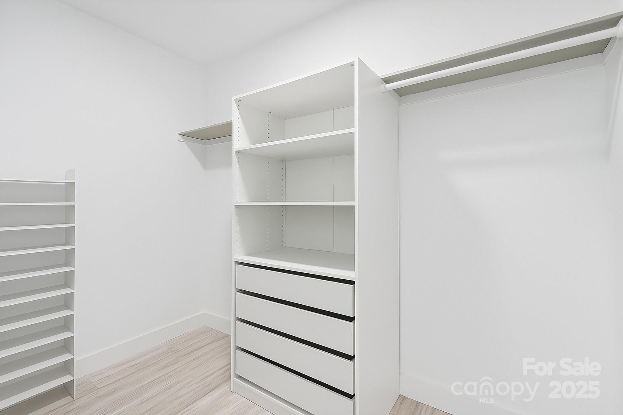456 Hickory Loop Road Rutherfordton, NC 28139 - Photo 24 of 38 a view of walk in closet with empty racks