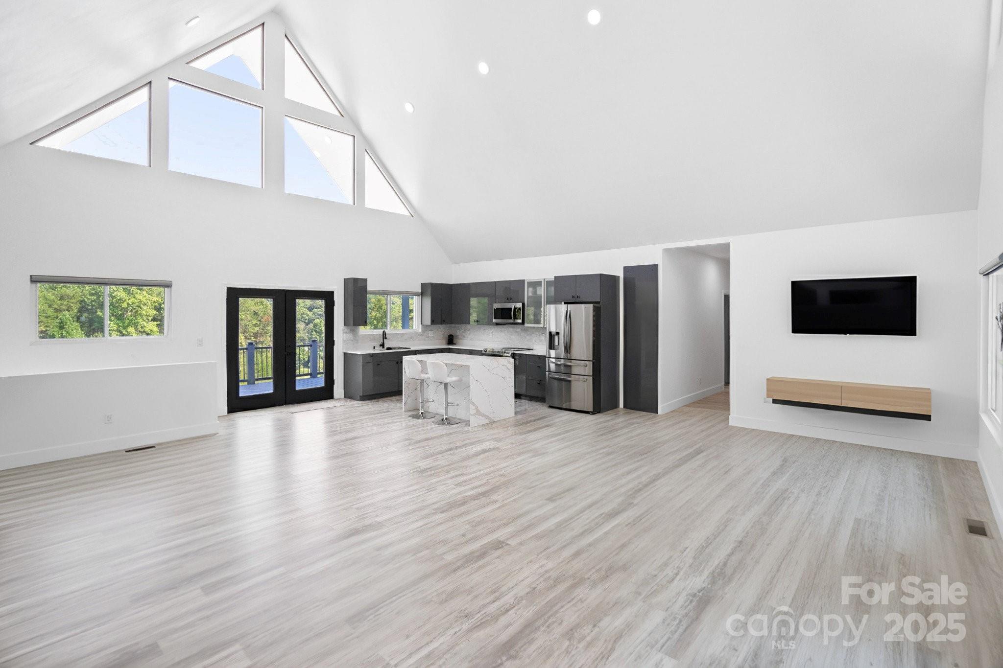 456 Hickory Loop Road Rutherfordton, NC 28139 - Photo 4 of 38 a view of kitchen with furniture and wooden floor