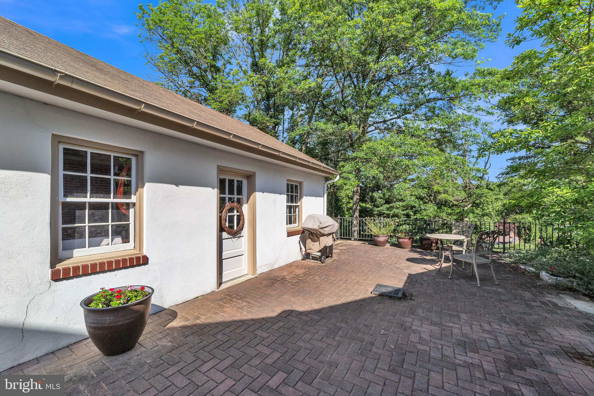 911 Sconnelltown Road West Chester, PA 19382 - Photo 26 of 28 Side of garage and large paver patio