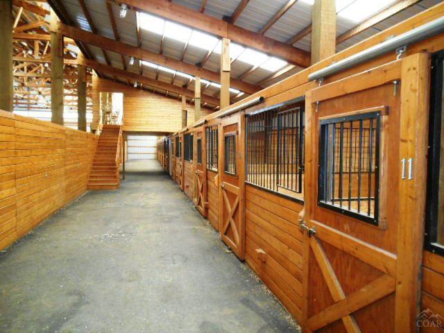 18989 Couch Market Road Bend, OR 97703 - Photo 22 of 25 a view of an empty room with wooden walls