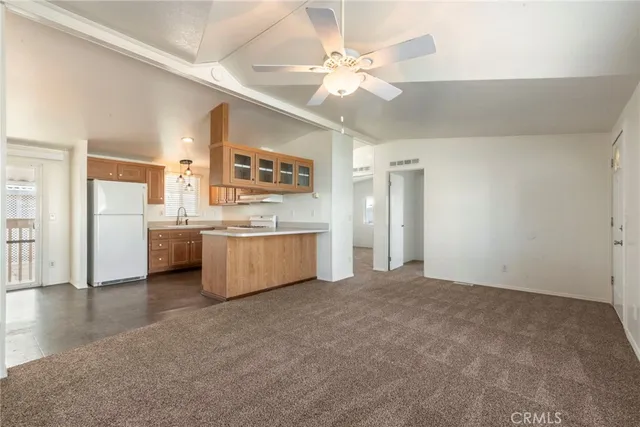 a view of a kitchen with a sink cabinets and a kitchen