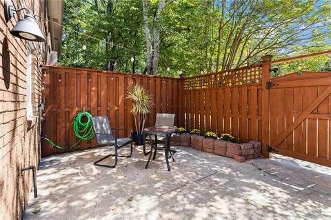 a view of outdoor space with chairs