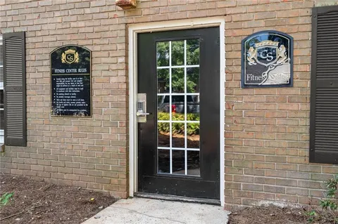 a view of a door and a window