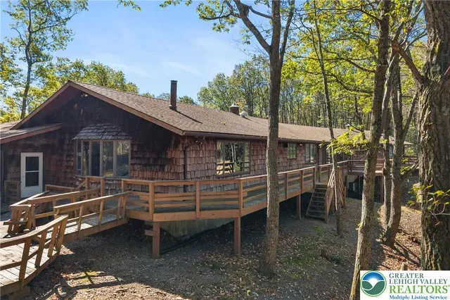 a view of a city with mountains in the background