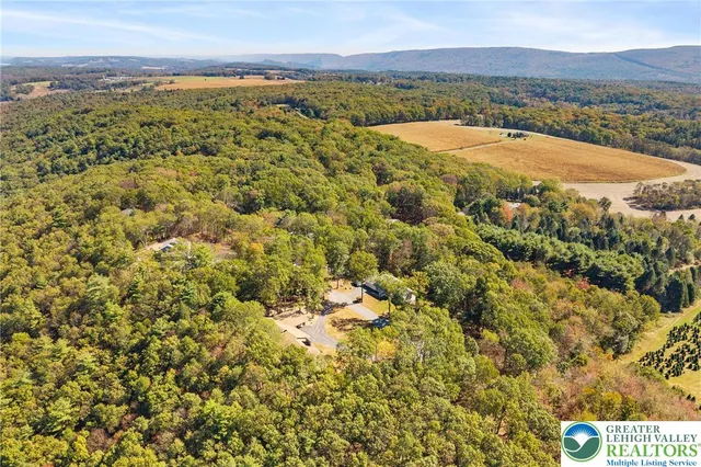 a kitchen with stainless steel appliances kitchen island granite countertop a sink and cabinets
