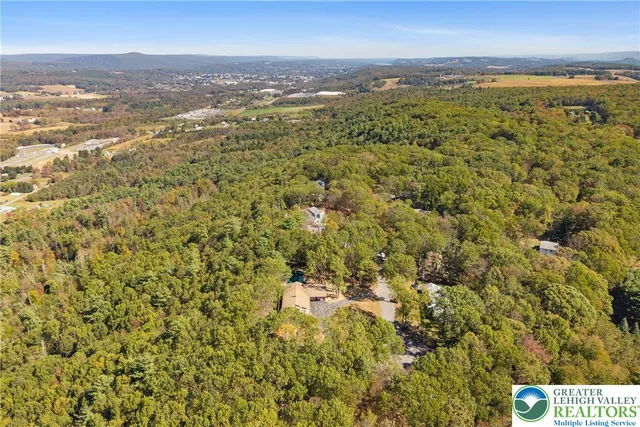 a kitchen with stainless steel appliances white cabinets and a stove