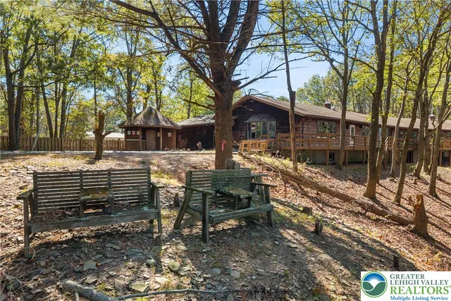 a kitchen with stainless steel appliances a stove microwave and cabinets