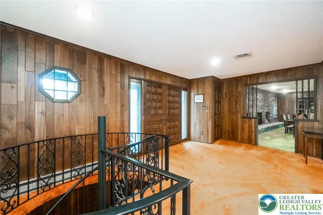 a bedroom with a bed and a cabinet