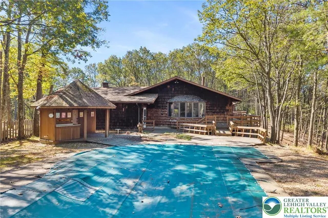 a front view of a house with a porch