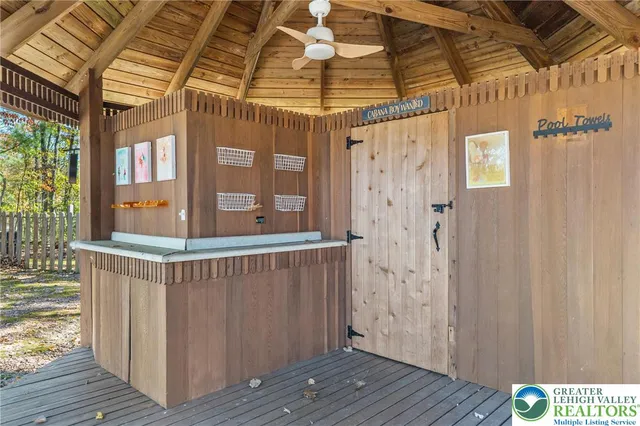 a backyard of a house with barbeque oven