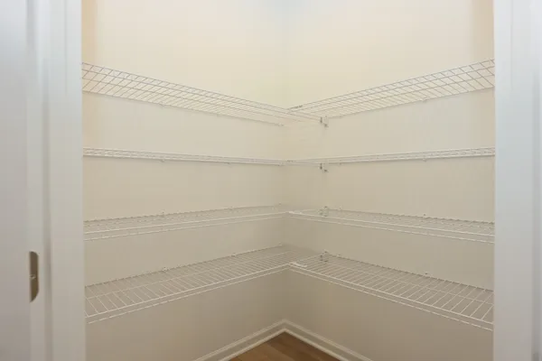 a kitchen that has a sink and a stove top oven