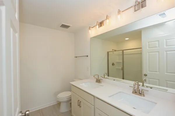 a view of a hallway with an entryway