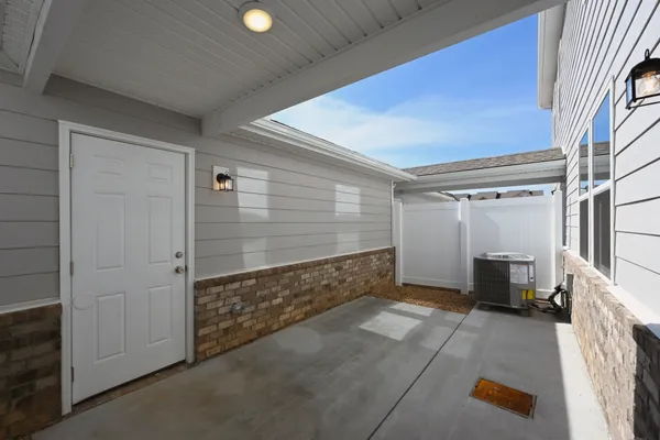 a view of a terrace with sitting area