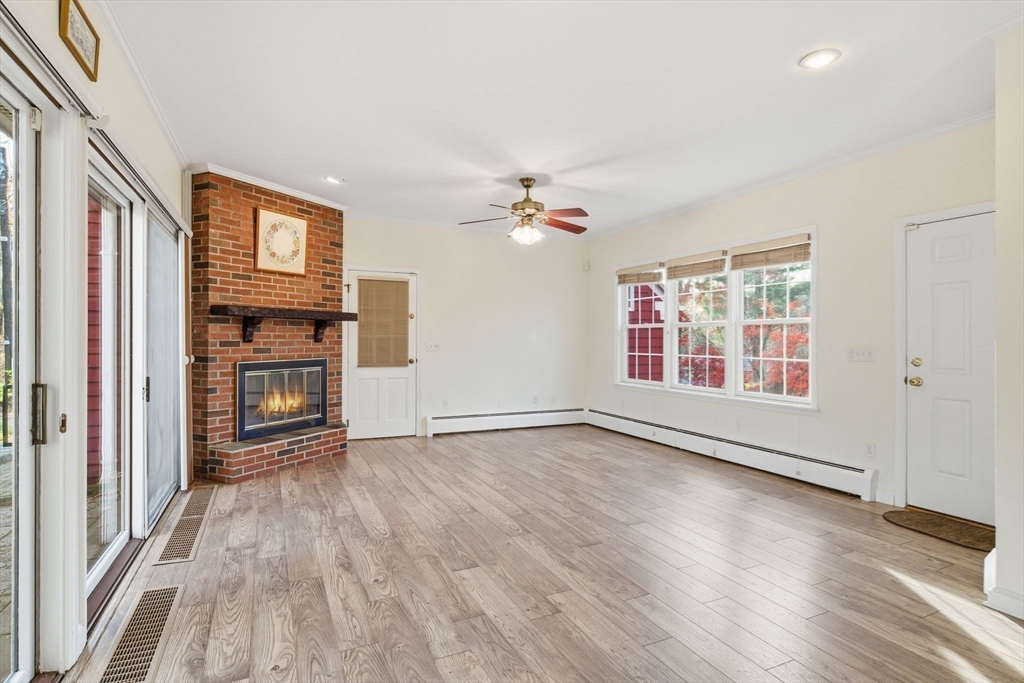 68 Monson Road Wilbraham, MA 01095 - Photo 8 of 39 wooden floor in an empty room with a window