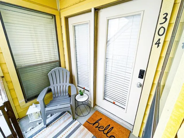 a view of a building with a yard