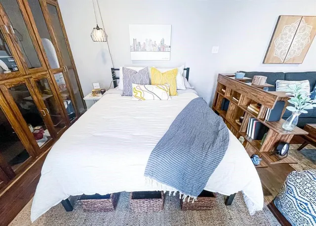 a bathroom with a toilet a sink and a mirror