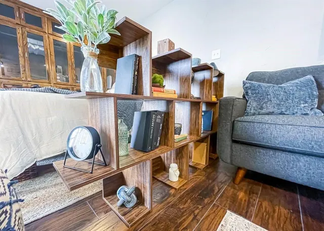 a kitchen with a refrigerator and a stove