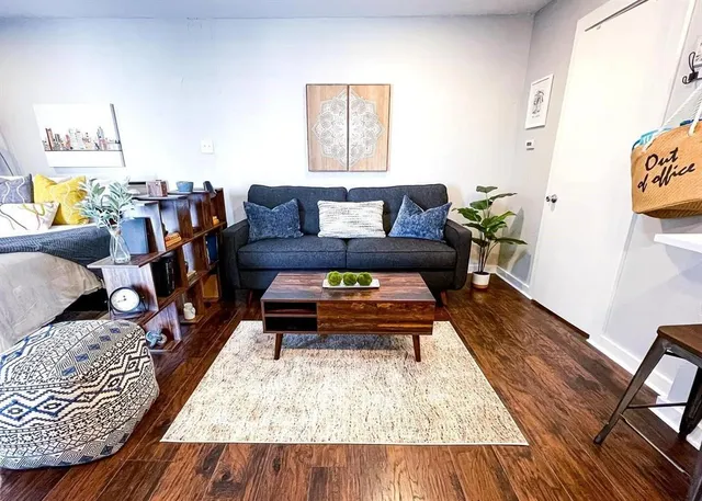 a kitchen with stainless steel appliances a stove a sink and a refrigerator