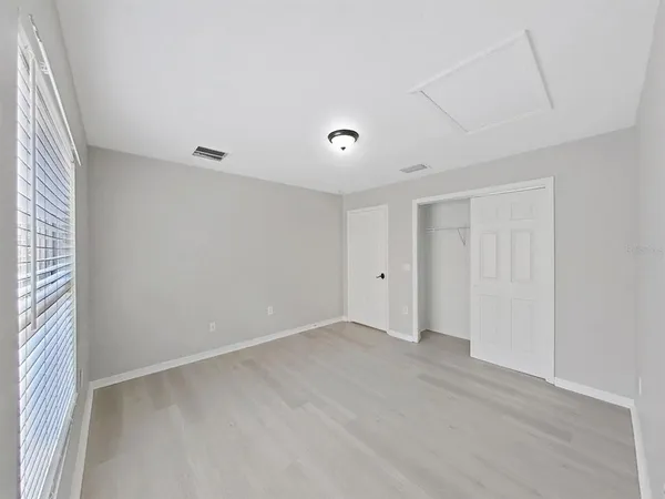 a view of a hallway with windows