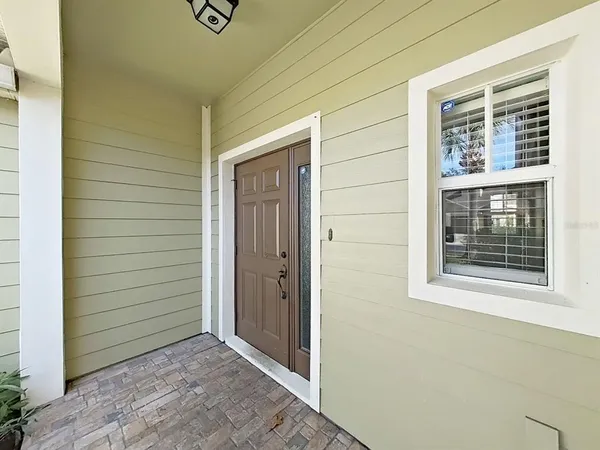 a view of a backyard with pathway