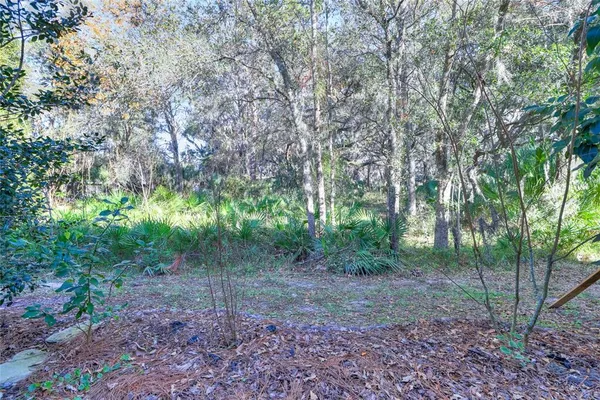 a view of swimming pool with outdoor seating