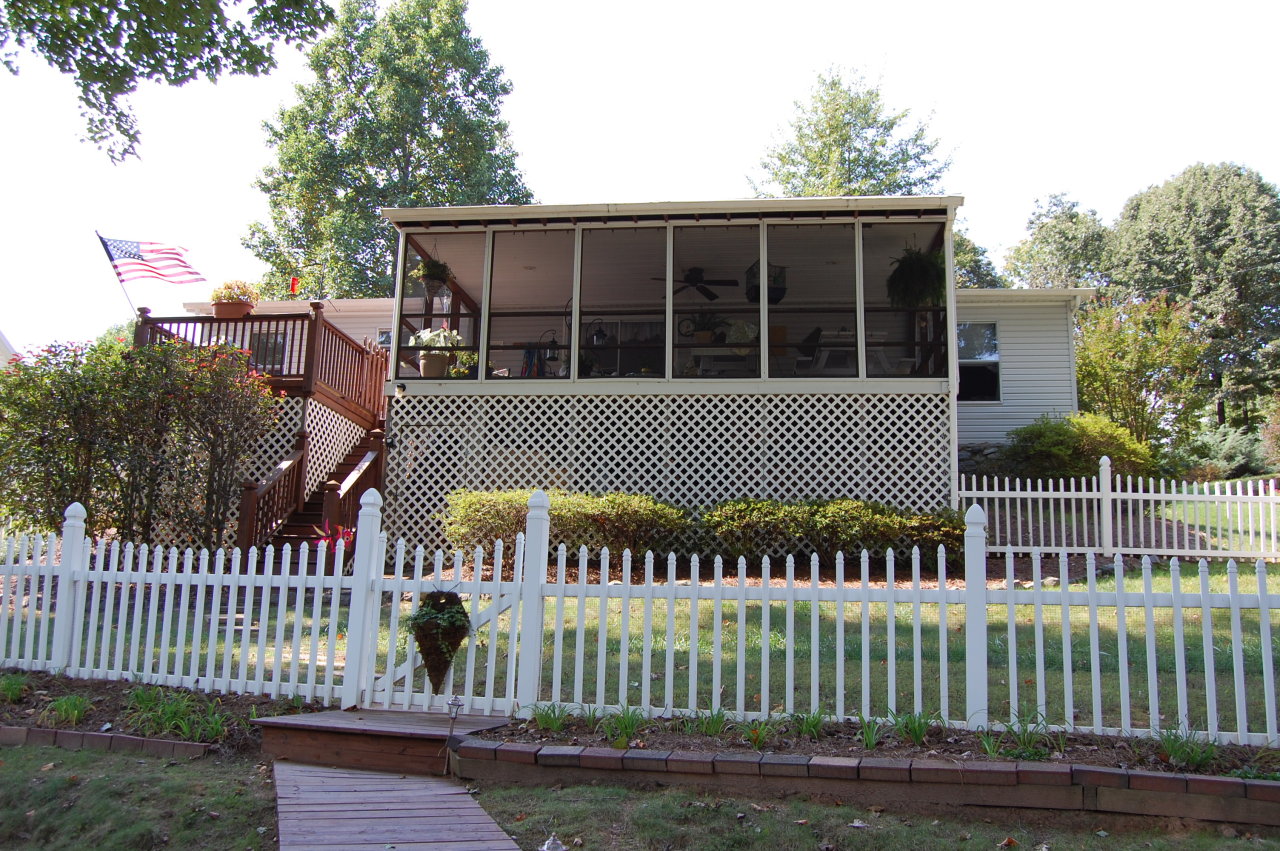 180 Cove Road Penhook, VA 24137 - Photo 20 of 33 a front view of a house with a garden