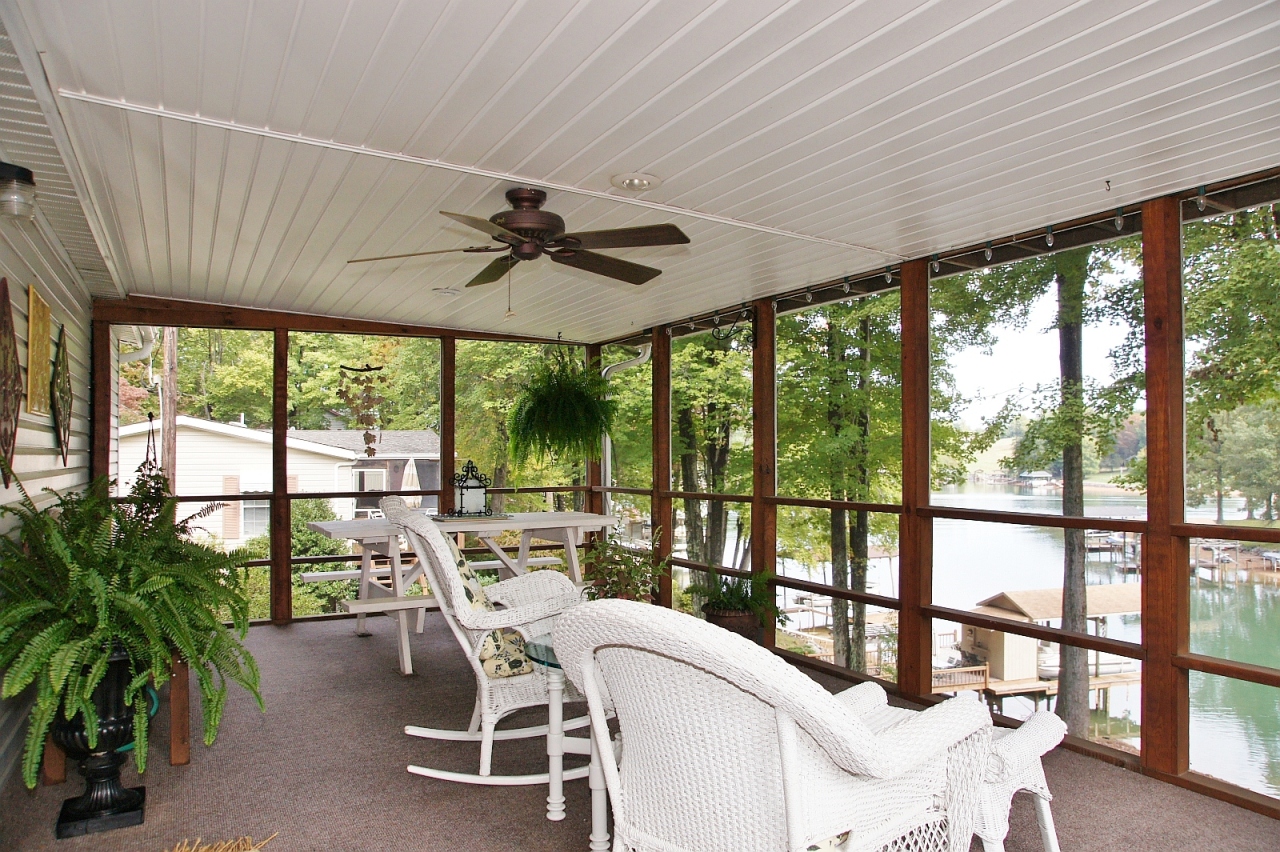 180 Cove Road Penhook, VA 24137 - Photo 3 of 33 a dining room with furniture water view and a large window