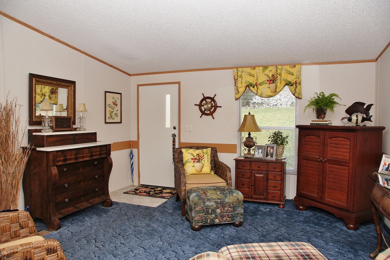 180 Cove Road Penhook, VA 24137 - Photo 22 of 33 a living room with furniture and wooden floor