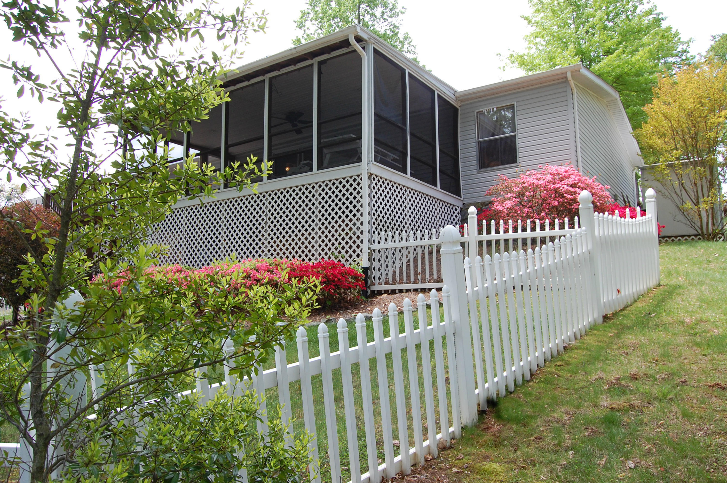 180 Cove Road Penhook, VA 24137 - Photo 29 of 33 a front view of a house having yard and tree
